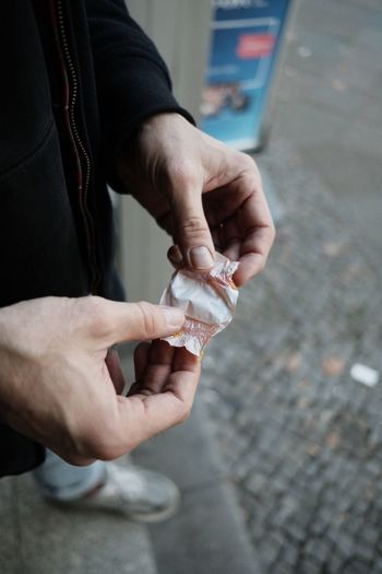 High angle view of man smoking cigarette