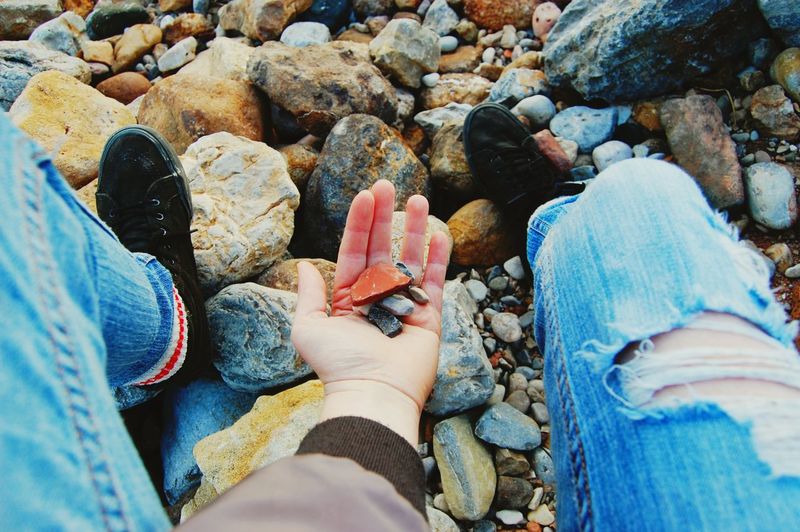 Close-up of woman holding stones
