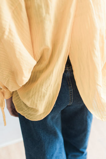 Low section of woman standing on floor