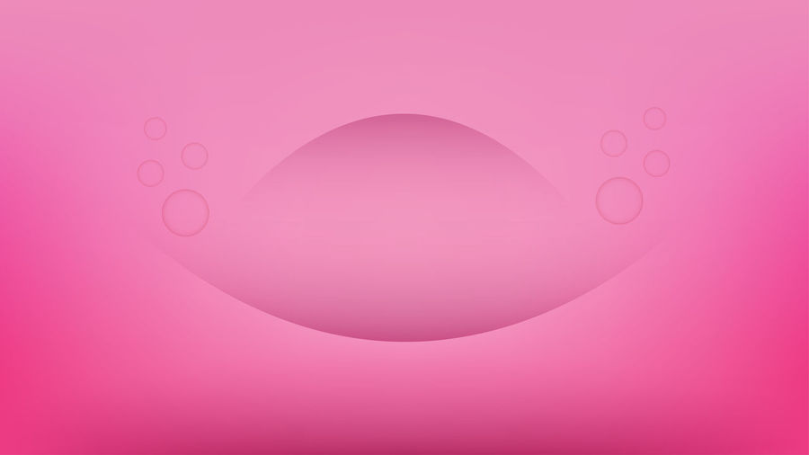 Close-up of bubbles against pink background