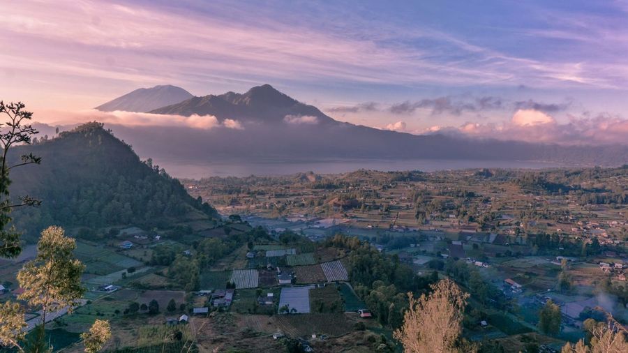 Aerial view of landscape against sky during sunset