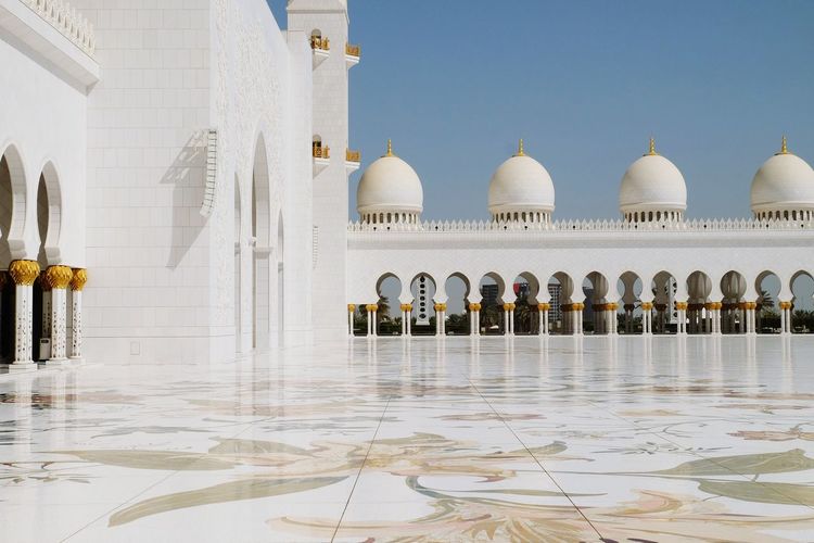 Grand mosque against clear sky
