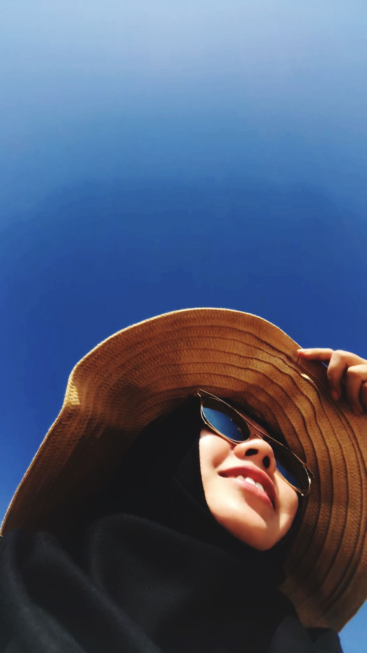 Close Up Of Woman Wearing Sunglasses And Id