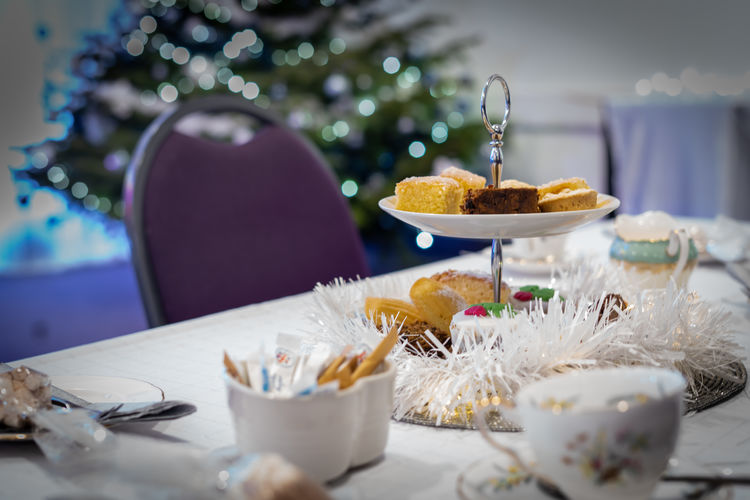 Cakes in plate on table