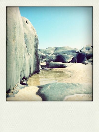 Rock formations against clear sky