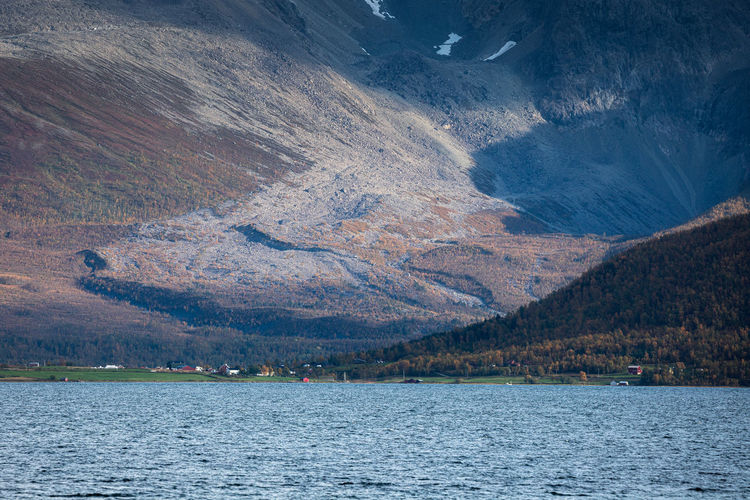 Scenic view of lake against mountain range