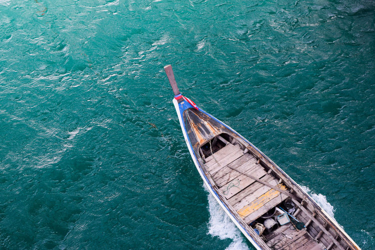 High angle view of boat sailing in sea