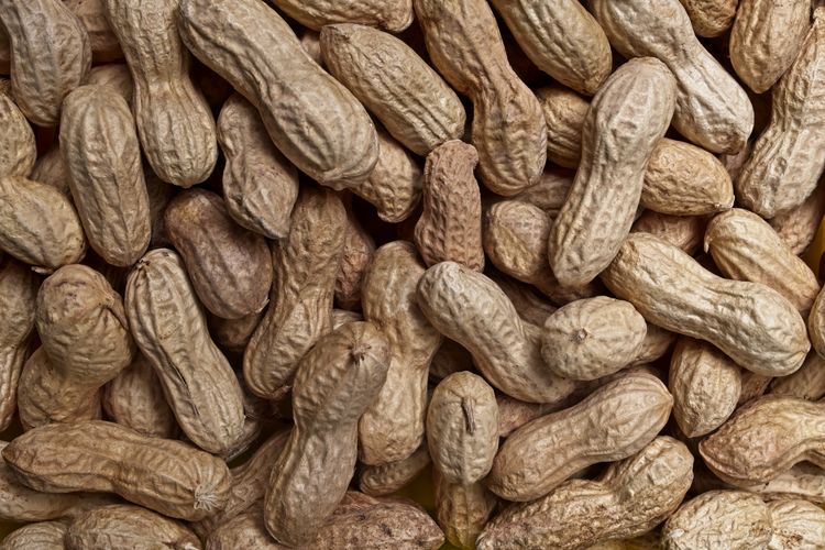 Roasted peanuts texture background.