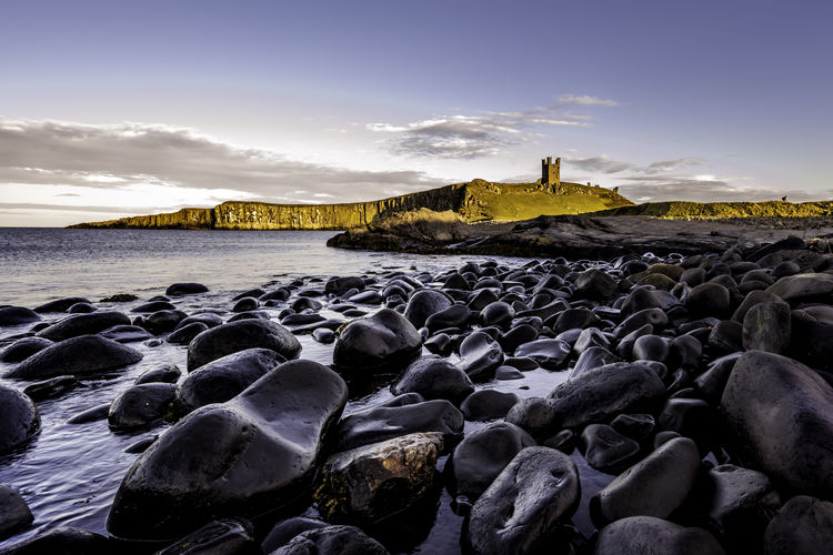 Sunlit castle on the coast