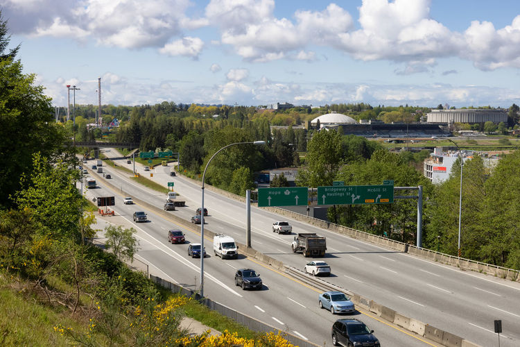 High angle view of cars on road against sky