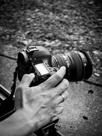 Man photographing camera