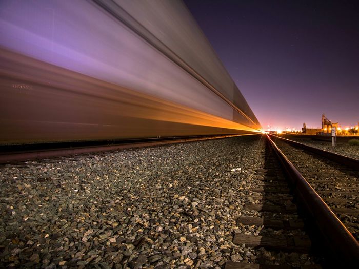 Train on railroad track at night