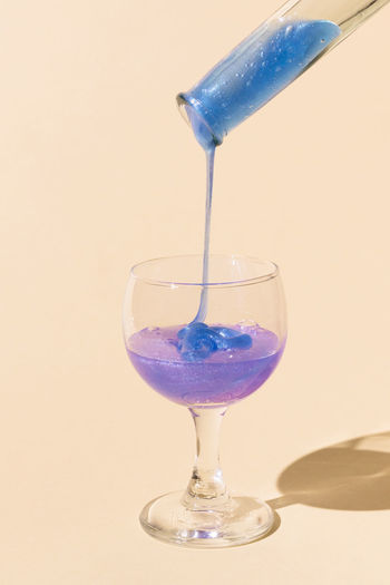 Close-up of wineglass on glass
