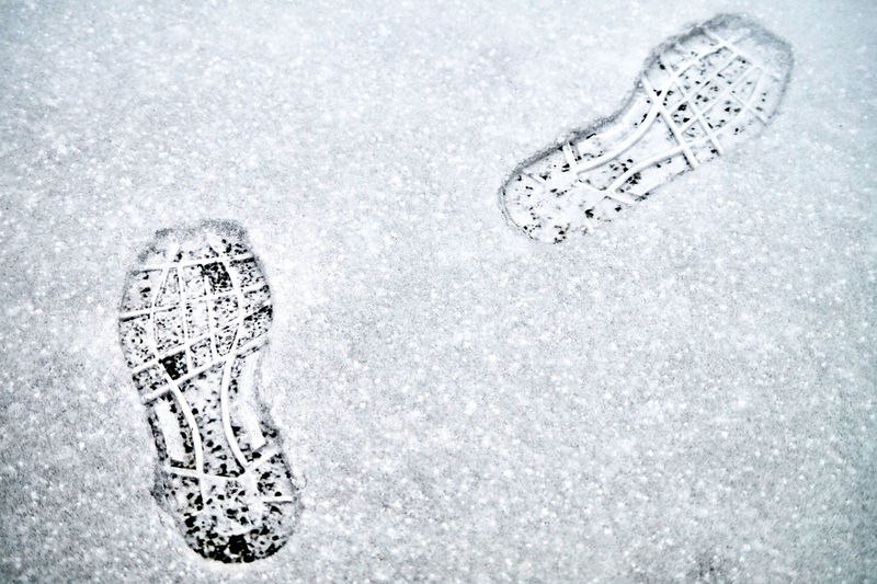 High angle view of footprints in snow