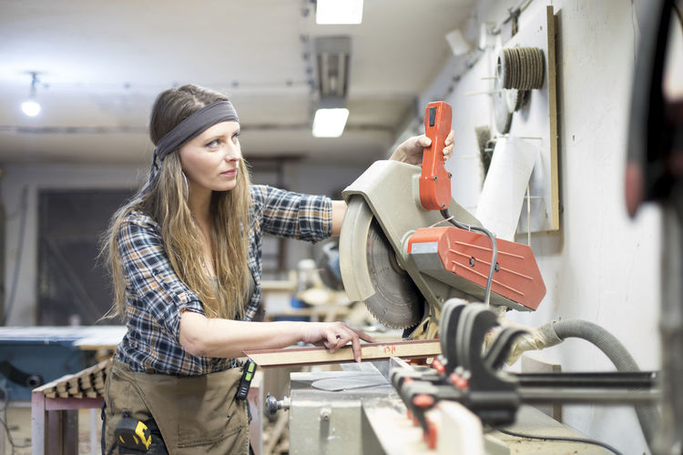 Woman working in workshop