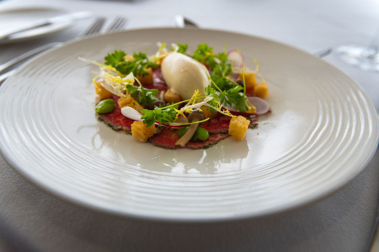 Close-up of food in plate on table