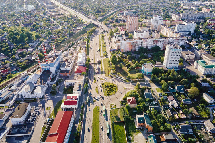 Cityscape of gomel, belarus. aerial view of town architecture. city streets at sunset, bird eye view