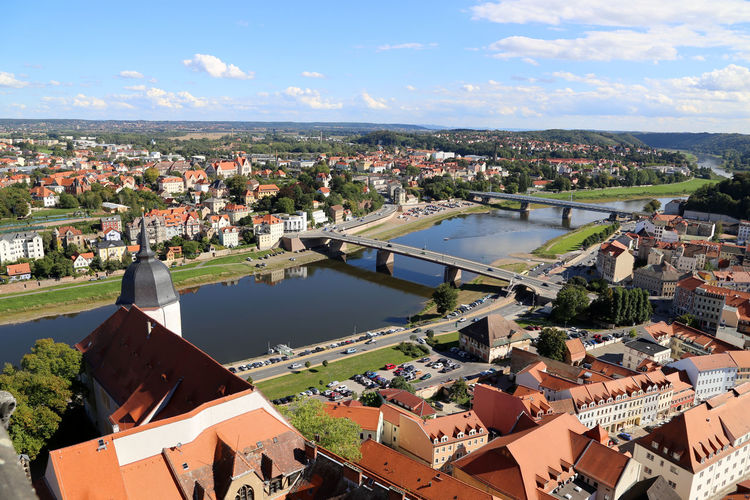 High angle view of bridge over elbe river against sky in town