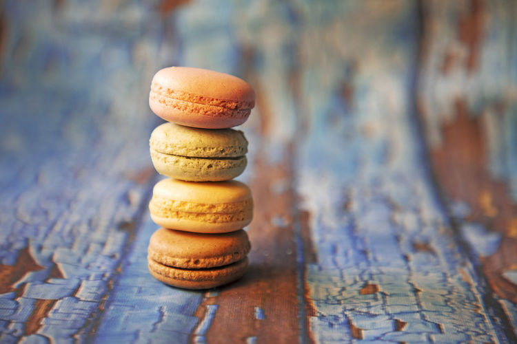 Macarons on wooden background
