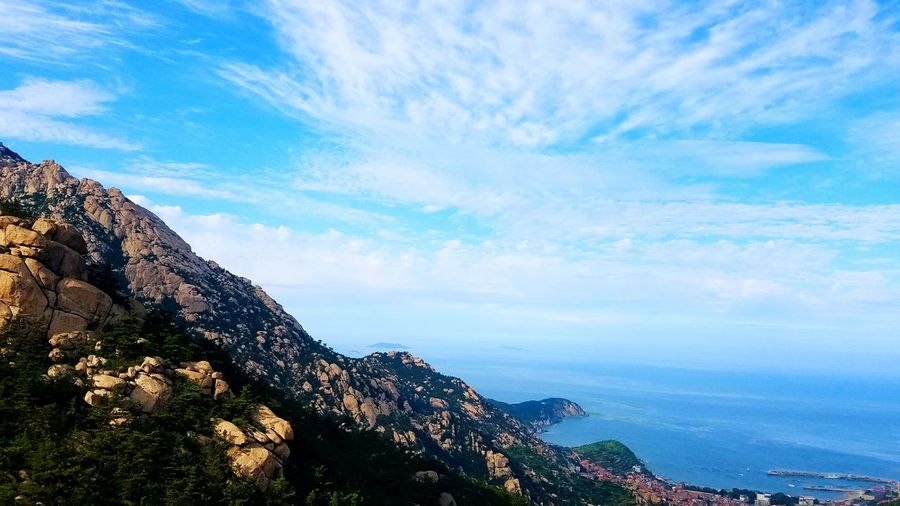 Scenic view of mountain against east china sea