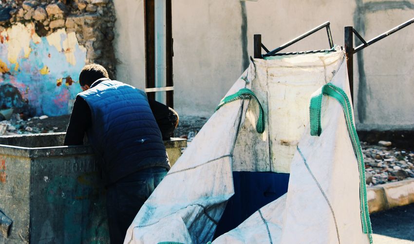 Rear view of people working