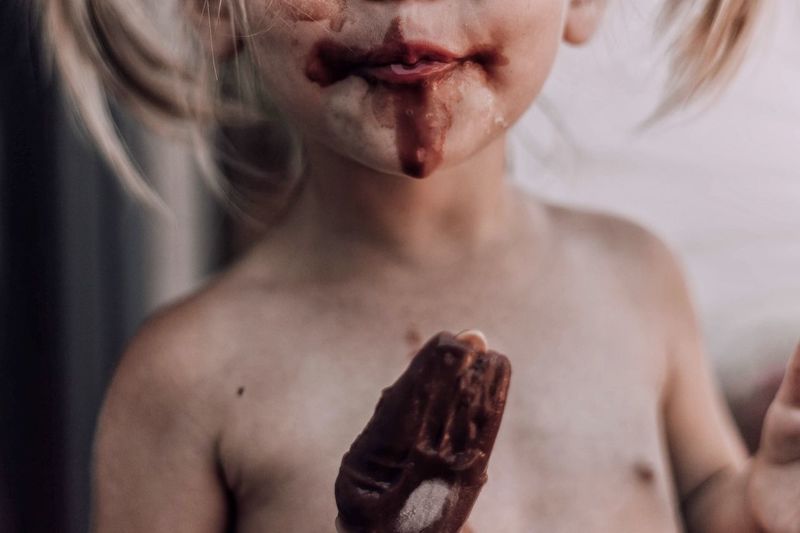Popsicle. One Person Real People Shirtless Front View Close-up Indoors Food And Drink Focus On Foreground Human Body Part Lifestyles Young Adult Human Hand Sweet Food Food Blond Hair Day People