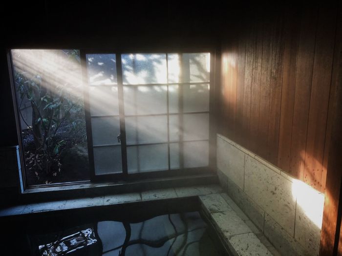 Sunlight streaming through window in house