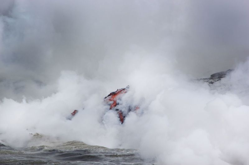 Molten lava by sea