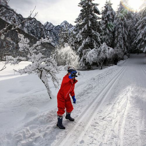 Full length of person on snow covered field