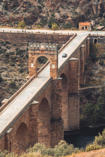 Arch bridge over river