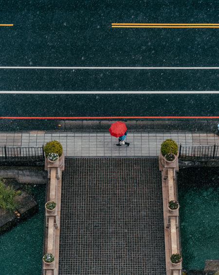 High angle view of road by railing