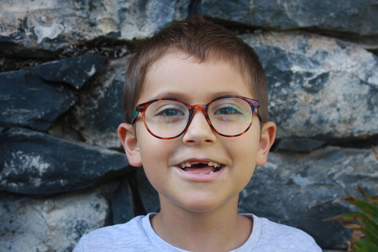 Portrait of smiling boy with gap toothed