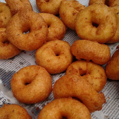 High angle view of medu vada on paper