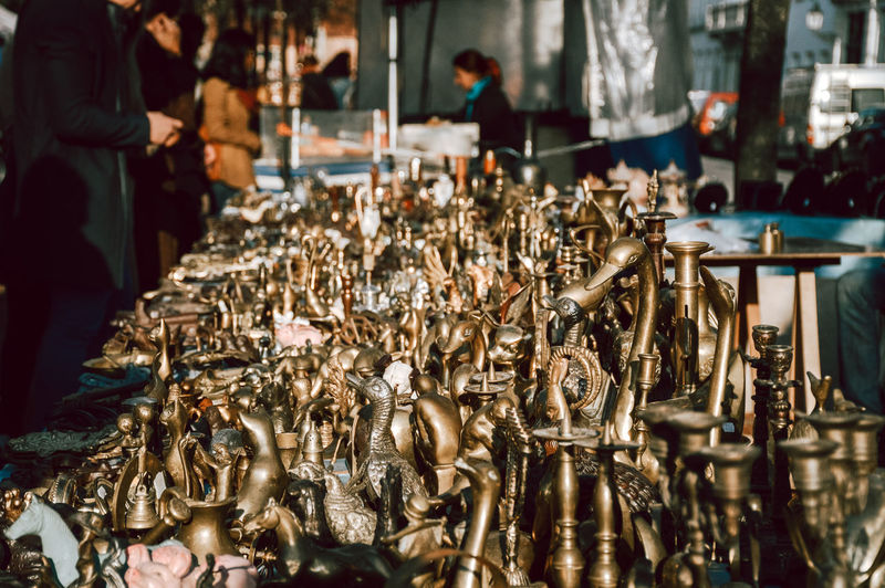 Metallic figures at flea market