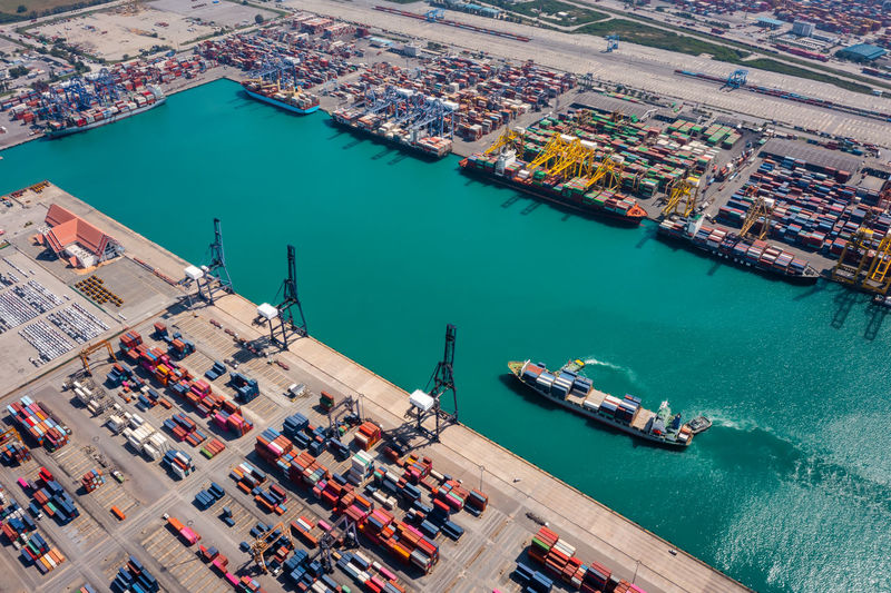 Aerial view container ship global business import export logistic transportation commercial dock 