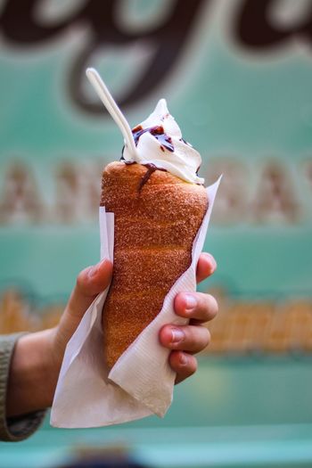 Close-up of hand holding ice cream