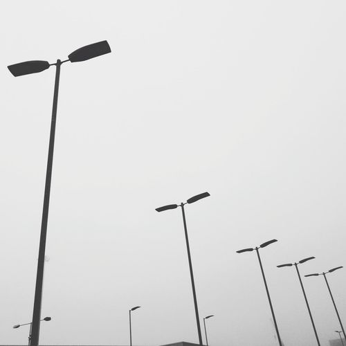 Low angle view of street light against clear sky