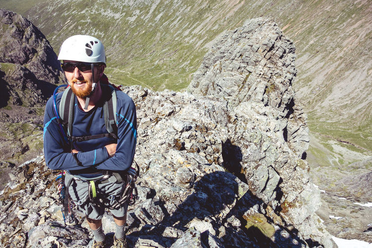 High angle portrait of man on rock