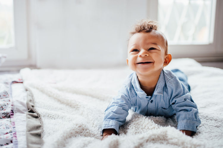 Portrait of smiling baby at home