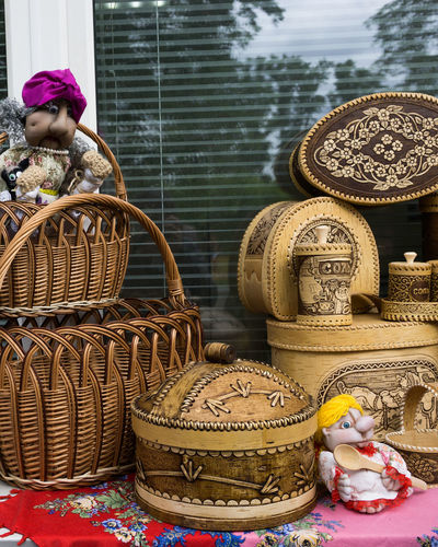 Close-up of female sculpture in basket for sale