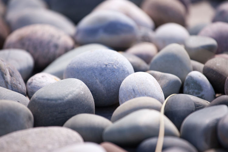 Close-up of pebbles at beach