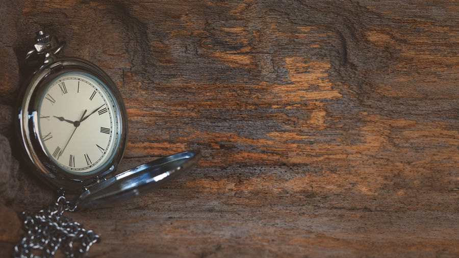 Close-up of clock on wall