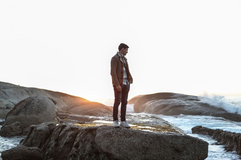 Man standing on rock formation
