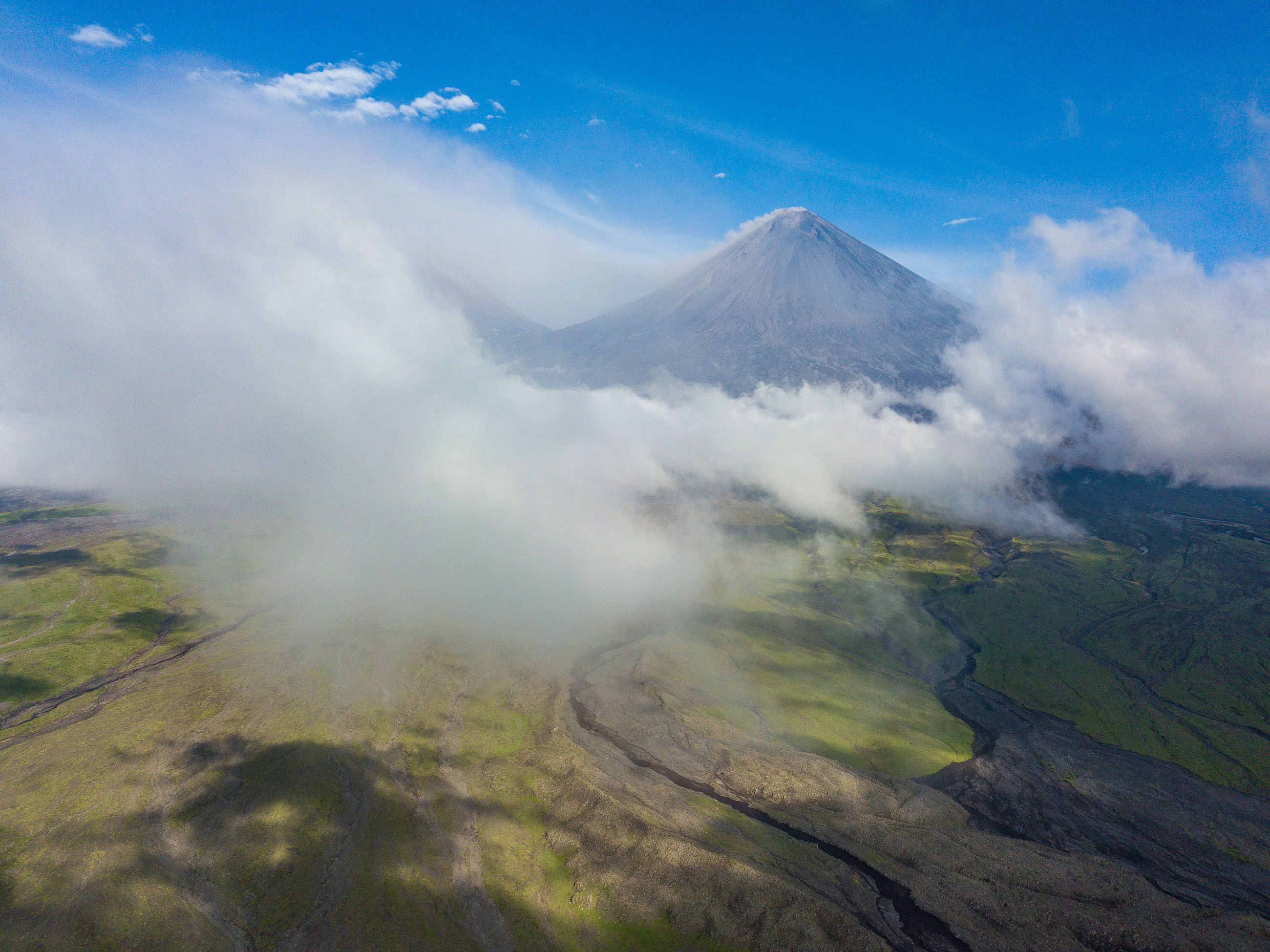 landscape, mountain, volcanic landscape, volcano, physical geography, scenics, geology, beauty in nature, nature, tranquil scene, sky, tranquility, volcanic crater, majestic, smoke - physical structure, outdoors, cloud - sky, day, no people, travel destinations, power in nature, erupting, mountain range, fog