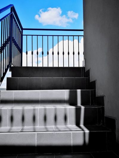 Low angle view of staircase against sky