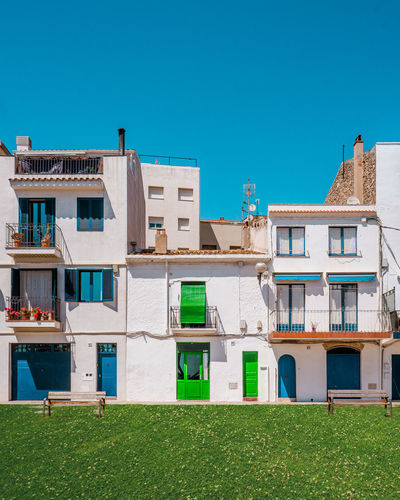 Residential building against blue sky