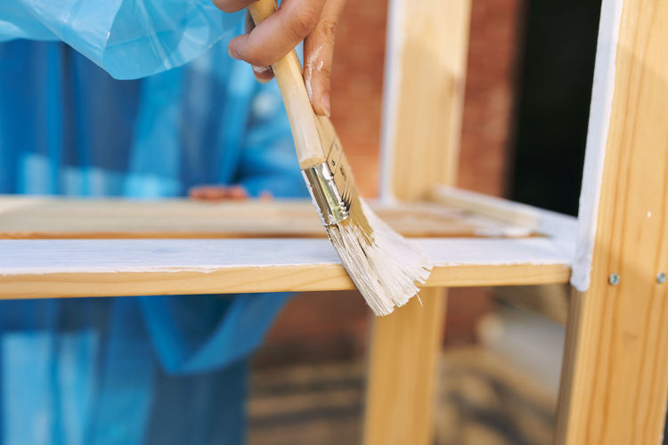 Close-up of man working on wood