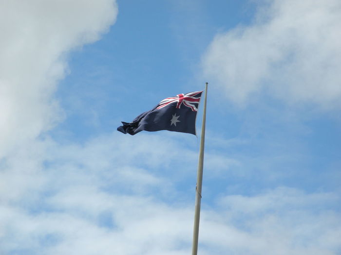 Low angle view of australian flag against sky