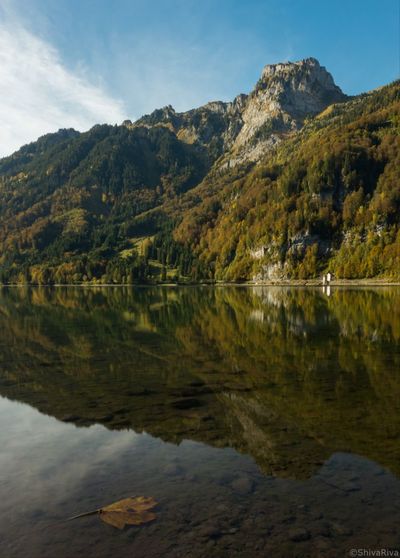 Reflection of mountain in calm lake