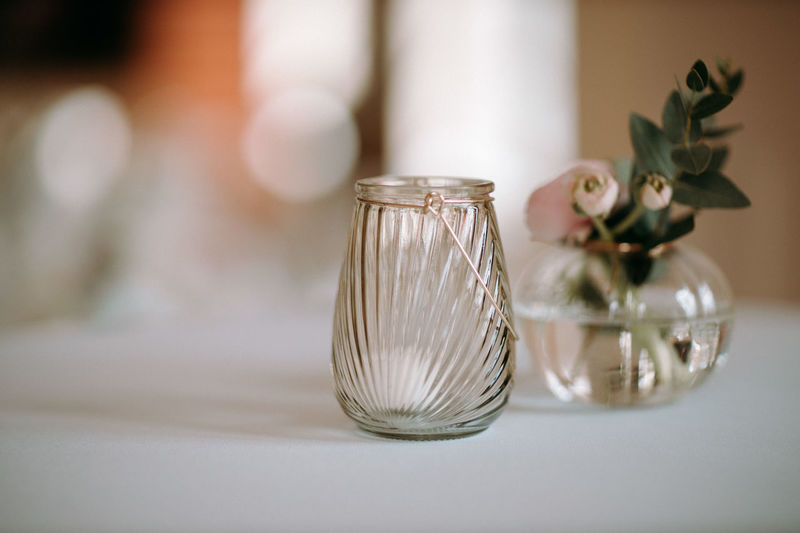 Close-up of glass vase on table at home